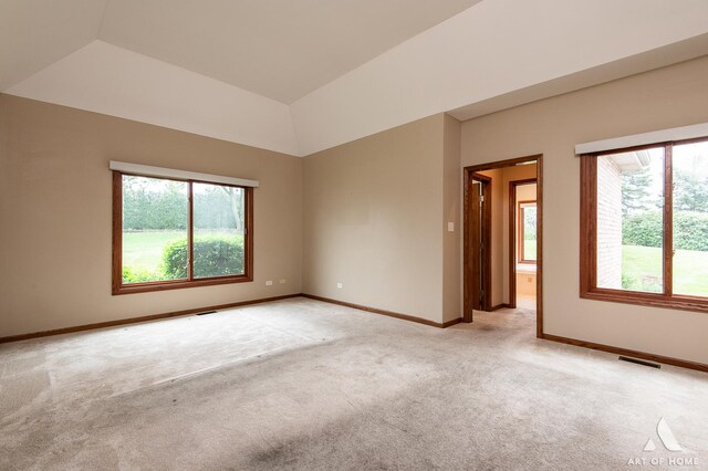 10801 Jillian Rd, Orland Park, IL 60467 - spare room with light carpet, baseboards, and vaulted ceiling