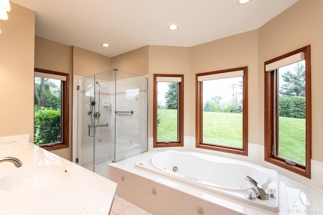 10801 Jillian Rd, Orland Park, IL 60467 - bathroom featuring a shower stall, a tub with jets, recessed lighting, double vanity, and tile patterned flooring