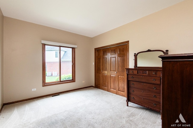 10801 Jillian Rd, Orland Park, IL 60467 - bedroom featuring light colored carpet, baseboards, and a closet