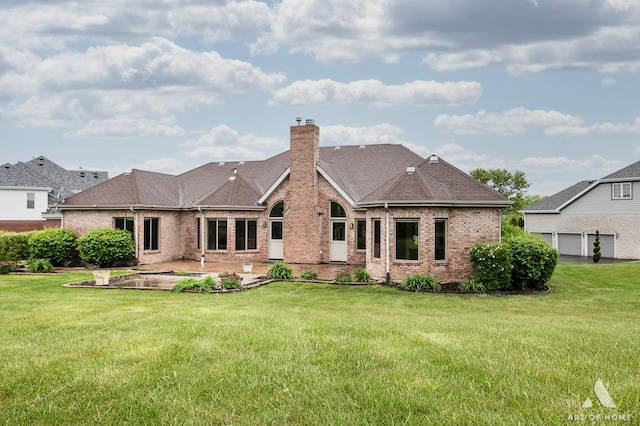 10801 Jillian Rd, Orland Park, IL 60467 - rear view of property featuring brick siding, a patio, a chimney, and a yard