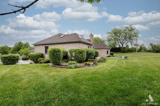 10801 Jillian Rd, Orland Park, IL 60467 - view of property exterior with a chimney, a yard, and brick siding