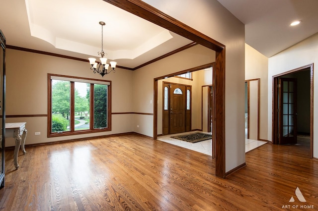 10801 Jillian Rd, Orland Park, IL 60467 - foyer entrance featuring a chandelier, wood finished floors, a raised ceiling, baseboards, and recessed lighting