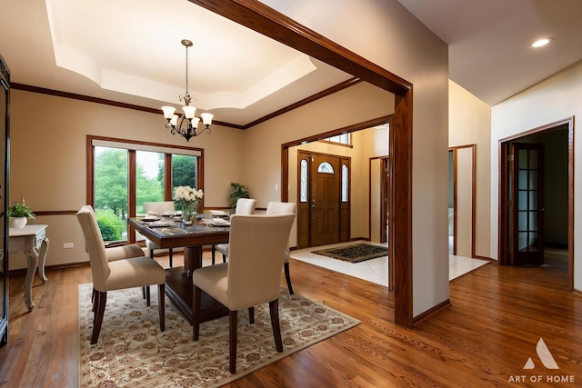 10801 Jillian Rd, Orland Park, IL 60467 - dining room with a chandelier, a tray ceiling, wood finished floors, recessed lighting, and baseboards