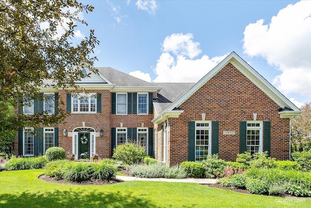 39W835 Carl Sandburg Rd, Saint Charles, IL 60175 - colonial-style house featuring brick siding and a front lawn