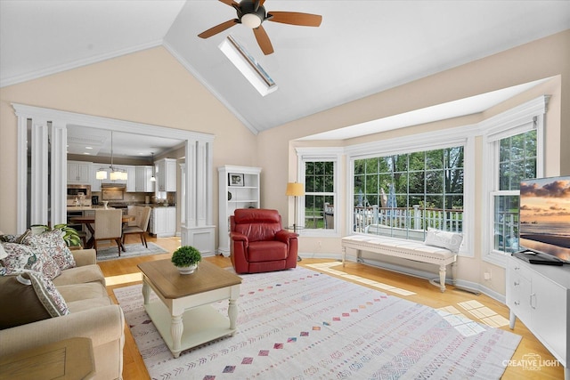 39W835 Carl Sandburg Rd, Saint Charles, IL 60175 - living area featuring ceiling fan, light wood-type flooring, vaulted ceiling, and baseboards