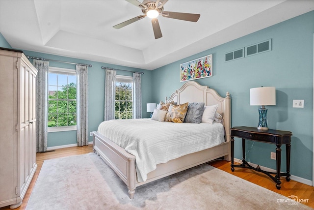 39W835 Carl Sandburg Rd, Saint Charles, IL 60175 - bedroom with a raised ceiling, light wood finished floors, baseboards, and a ceiling fan