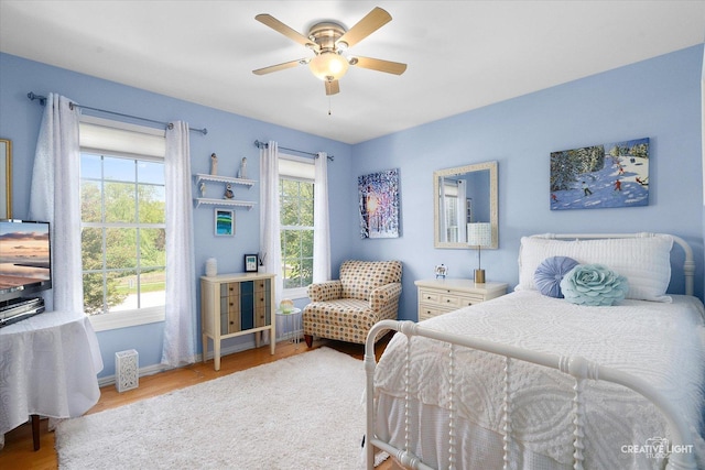 39W835 Carl Sandburg Rd, Saint Charles, IL 60175 - bedroom with multiple windows, wood finished floors, and baseboards