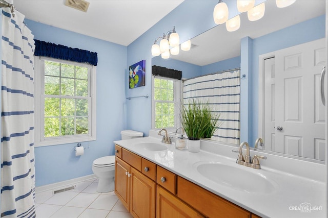39W835 Carl Sandburg Rd, Saint Charles, IL 60175 - bathroom featuring double vanity, toilet, tile patterned floors, baseboards, and a shower with curtain