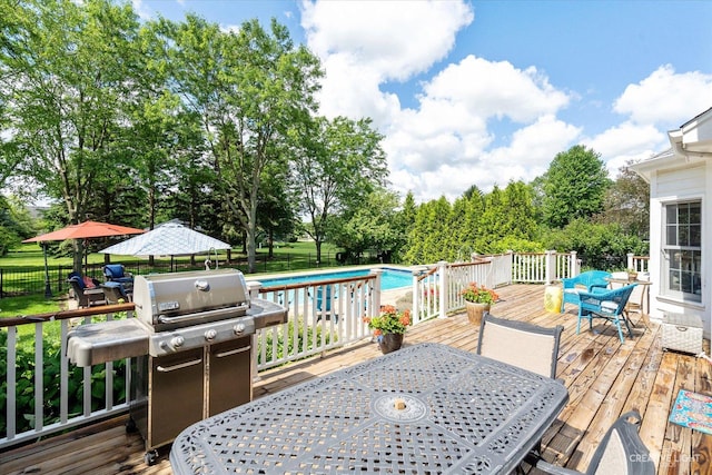 39W835 Carl Sandburg Rd, Saint Charles, IL 60175 - wooden deck with outdoor dining space, a grill, and view of wooded area