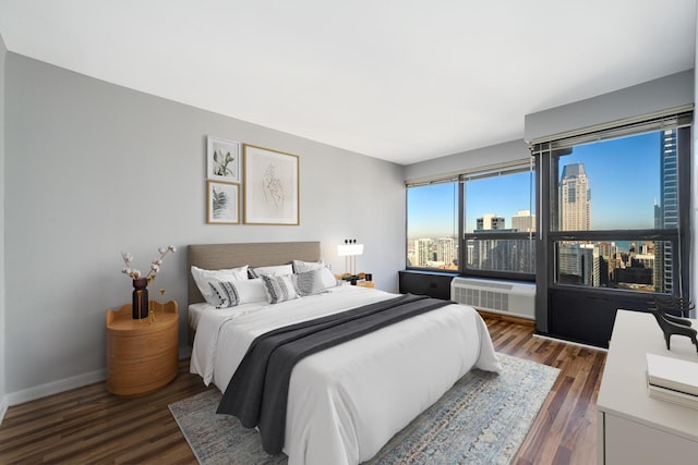 30 E Huron St Unit 4108, Chicago, IL 60611 - bedroom with wood finished floors, radiator, a view of city, and baseboards