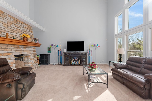 876 Hampstead Ct, Barrington, IL 60010 - carpeted living room featuring a high ceiling, baseboards, and a fireplace