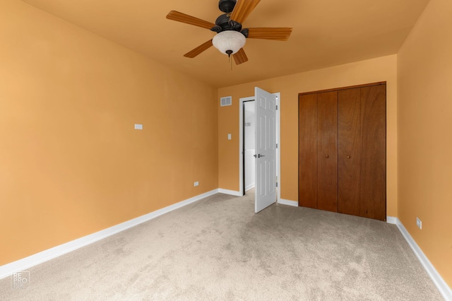 9352 Sunrise Ln Unit B1, Orland Park, IL 60462 - unfurnished bedroom with carpet floors, a closet, and a ceiling fan