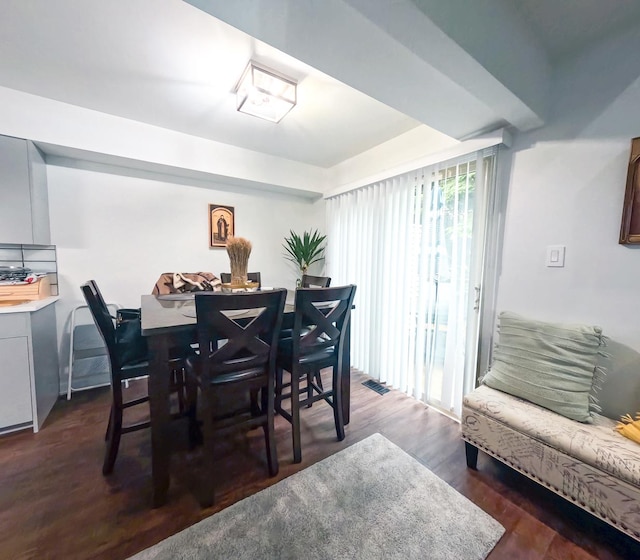 9352 Sunrise Ln Unit B1, Orland Park, IL 60462 - dining area featuring dark wood-style flooring