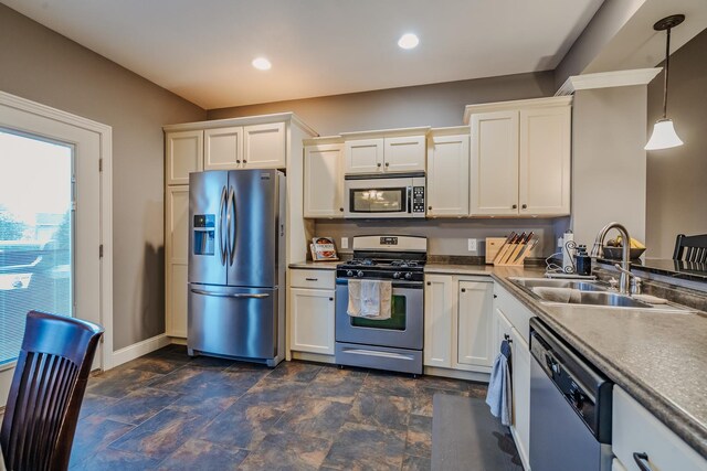 2786 Shepard Rd, Normal, IL 61761 - kitchen featuring stainless steel appliances, a sink, baseboards, white cabinetry, and recessed lighting