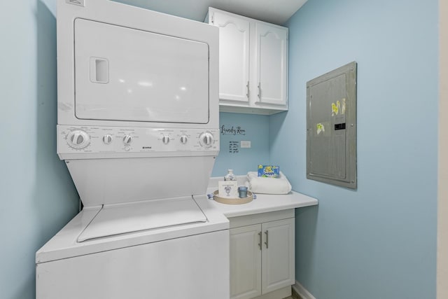 16228 Sussex Ave, Markham, IL 60428 - laundry room with stacked washing machine and dryer, electric panel, and cabinet space