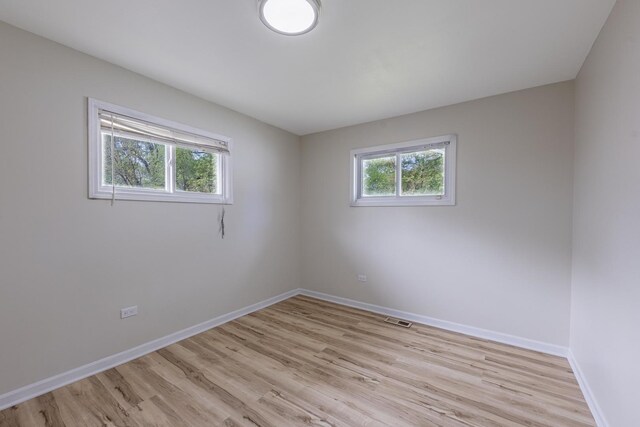 16228 Sussex Ave, Markham, IL 60428 - empty room with light wood-type flooring and baseboards