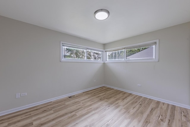 16228 Sussex Ave, Markham, IL 60428 - unfurnished room with light wood-style flooring and baseboards
