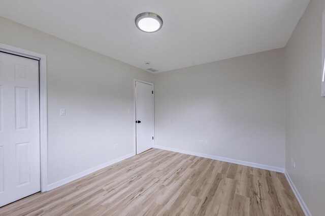 16228 Sussex Ave, Markham, IL 60428 - empty room featuring light wood-style flooring and baseboards