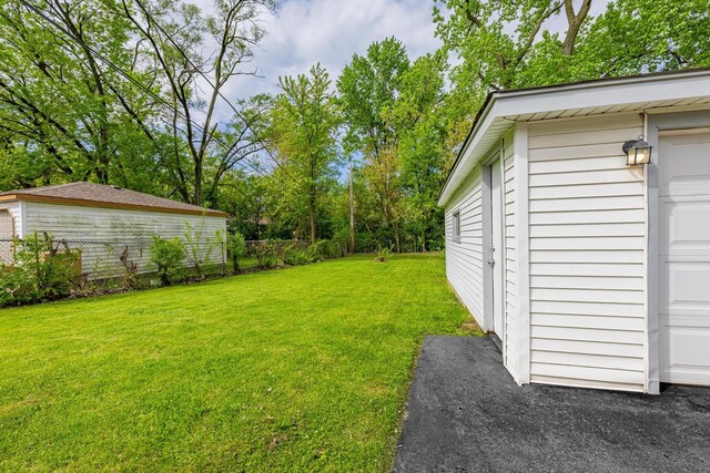 16228 Sussex Ave, Markham, IL 60428 - view of yard featuring a garage