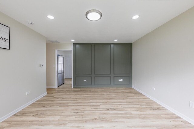 16228 Sussex Ave, Markham, IL 60428 - spare room featuring light wood-type flooring, recessed lighting, baseboards, and a smoke detector