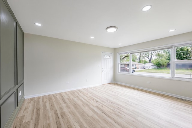 16228 Sussex Ave, Markham, IL 60428 - spare room featuring light wood-type flooring, baseboards, and recessed lighting