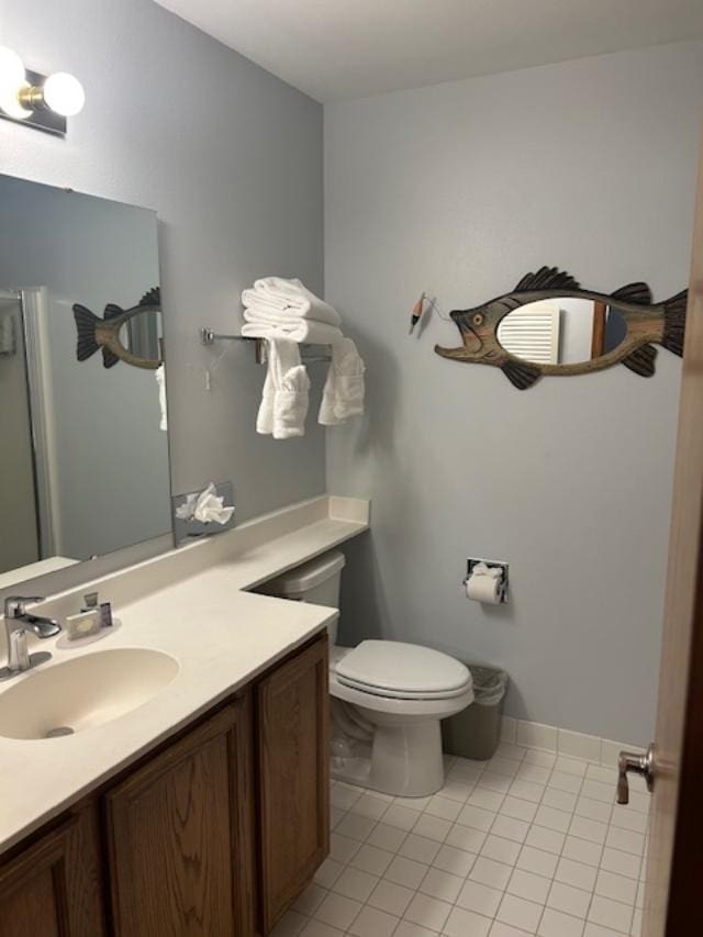 111 Center St Unit 441, Lake Geneva, WI 53147 - bathroom featuring tile patterned floors, vanity, toilet, and baseboards
