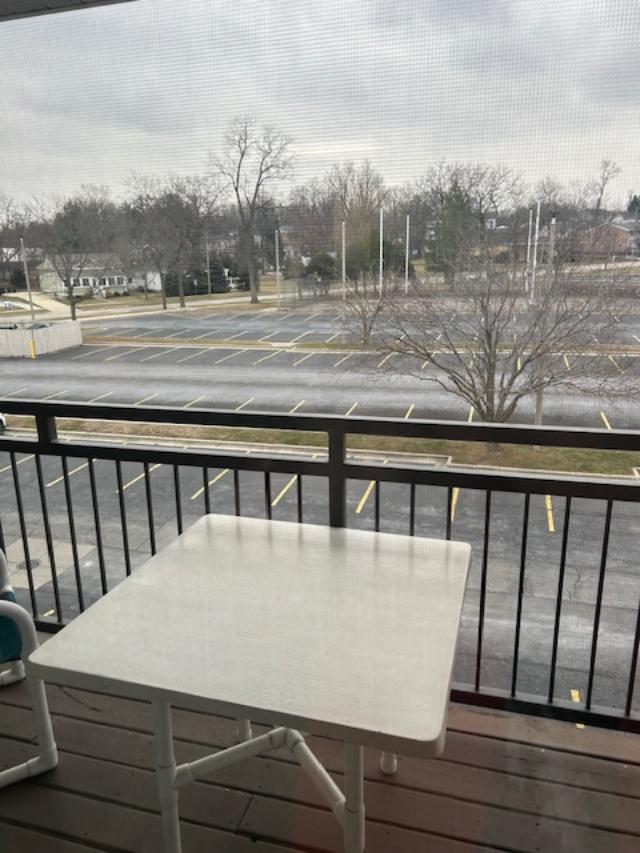 111 Center St Unit 441, Lake Geneva, WI 53147 - wooden deck with outdoor dining area