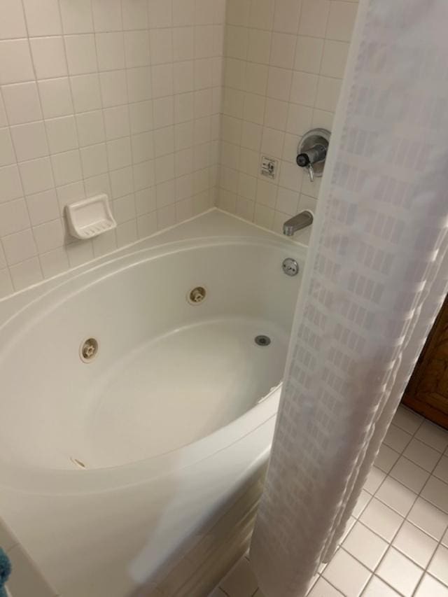 111 Center St Unit 441, Lake Geneva, WI 53147 - full bath featuring tile patterned floors and a combined bath / shower with jetted tub