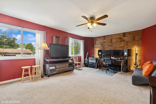 1511 Lakeland Ave, Mchenry, IL 60050 - home office with a ceiling fan, an accent wall, carpet floors, and wooden walls