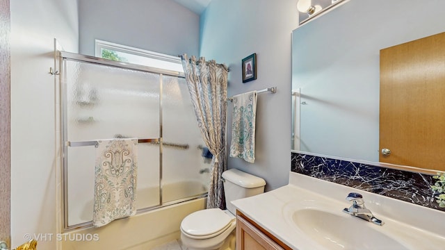 1031 S Wellington Rd, Waukegan, IL 60085 - full bath with bath / shower combo with glass door, vanity, and toilet