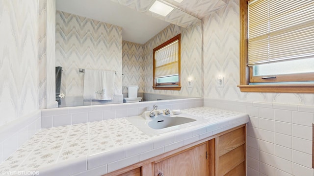 7421 N Crossway Rd, Fox Point, WI 53217 - bathroom with toilet, wallpapered walls, and vanity