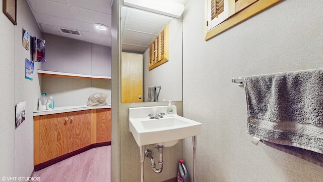 7421 N Crossway Rd, Fox Point, WI 53217 - bathroom with wood finished floors and a sink