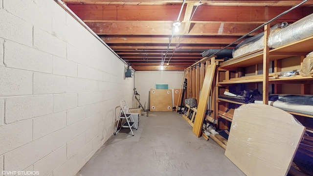 7421 N Crossway Rd, Fox Point, WI 53217 - unfinished below grade area featuring concrete block wall