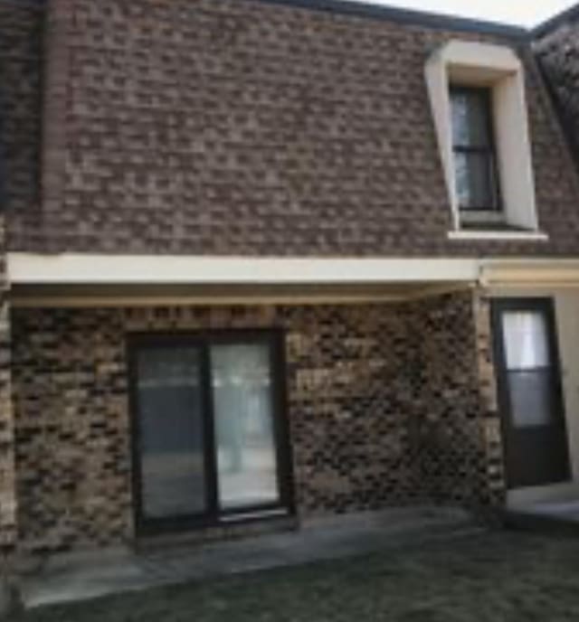 7804 Woodward Ave, Woodridge, IL 60517 - rear view of house featuring brick siding