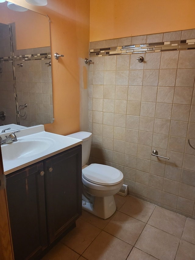 7804 Woodward Ave, Woodridge, IL 60517 - bathroom with vanity, tile patterned flooring, and toilet