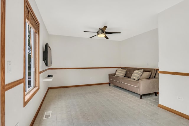 1328 Sunrise Ln, Gurnee, IL 60031 - sitting room featuring ceiling fan and baseboards
