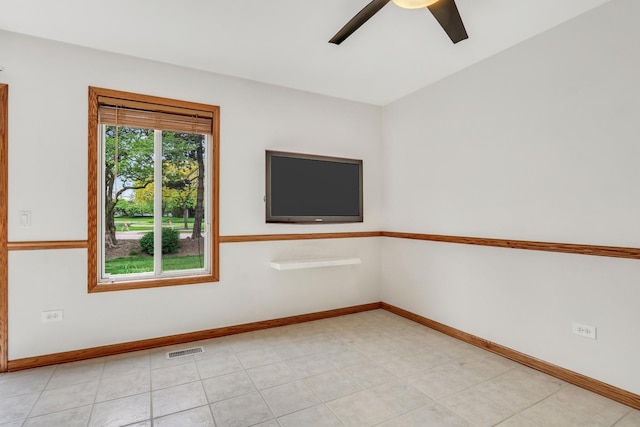 1328 Sunrise Ln, Gurnee, IL 60031 - empty room featuring ceiling fan and baseboards