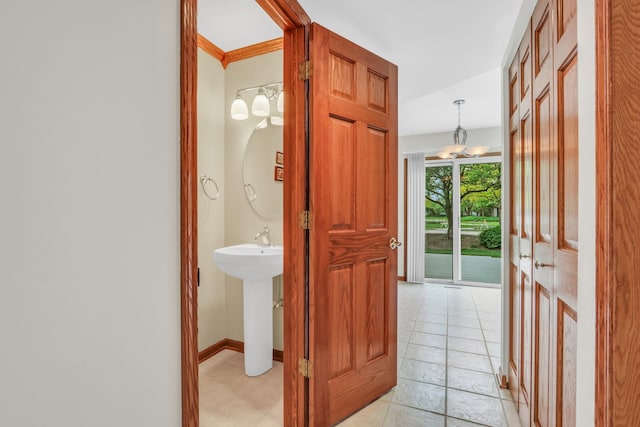 1328 Sunrise Ln, Gurnee, IL 60031 - foyer entrance with a chandelier and baseboards