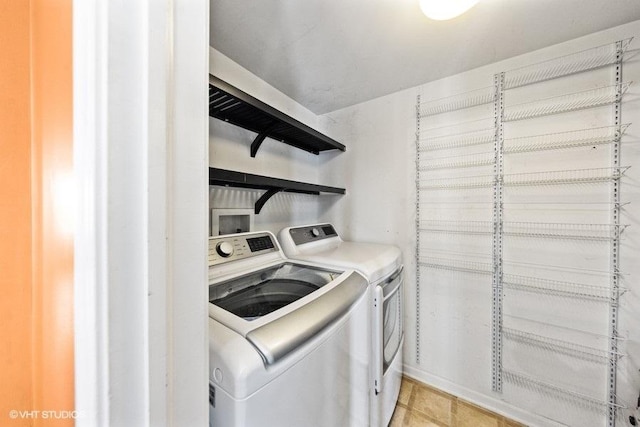 897 Clover Ln, Pingree Grove, IL 60140 - laundry room featuring separate washer and dryer and light tile patterned floors