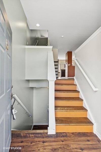 897 Clover Ln, Pingree Grove, IL 60140 - stairway with wood finished floors and baseboards