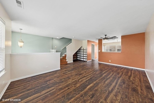 897 Clover Ln, Pingree Grove, IL 60140 - unfurnished living room featuring wood finished floors, baseboards, and stairs