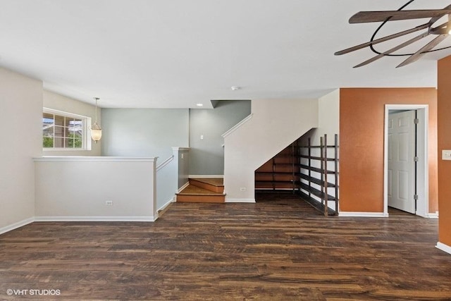 897 Clover Ln, Pingree Grove, IL 60140 - unfurnished living room featuring wood finished floors, baseboards, and a ceiling fan