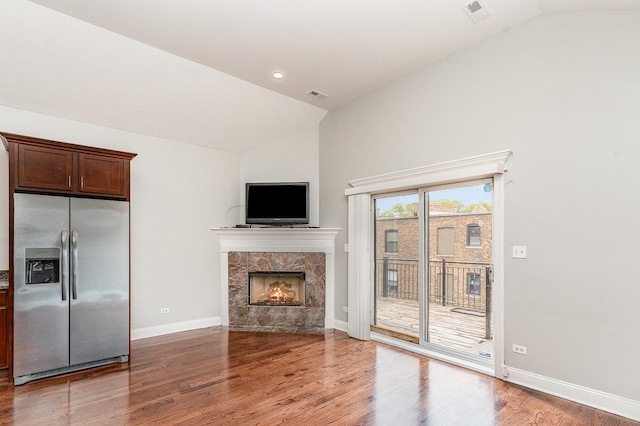 641 E 50th St Unit 3, Chicago, IL 60615 - unfurnished living room featuring a high end fireplace, wood finished floors, baseboards, high vaulted ceiling, and recessed lighting