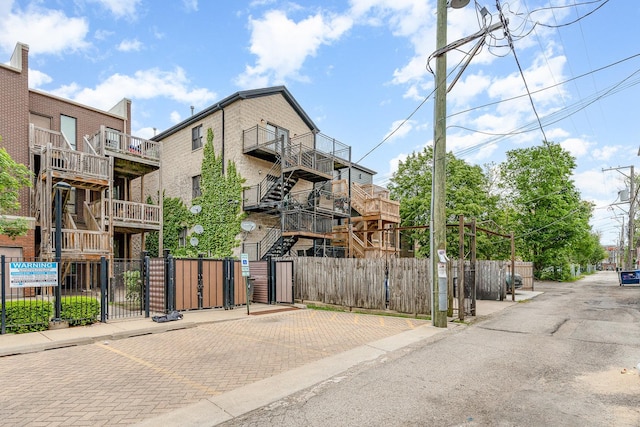 641 E 50th St Unit 3, Chicago, IL 60615 - view of asphalt street featuring a gate