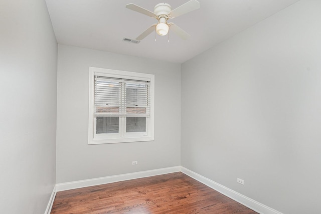 641 E 50th St Unit 3, Chicago, IL 60615 - unfurnished room with baseboards, wood finished floors, and a ceiling fan