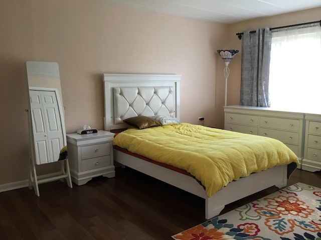 200 Deborah Ln NW Unit 16A, Wheeling, IL 60090 - bedroom featuring dark wood-style flooring and a closet