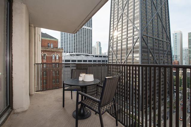 200 E Delaware Pl Unit 18F, Chicago, IL 60611 - balcony featuring a city view
