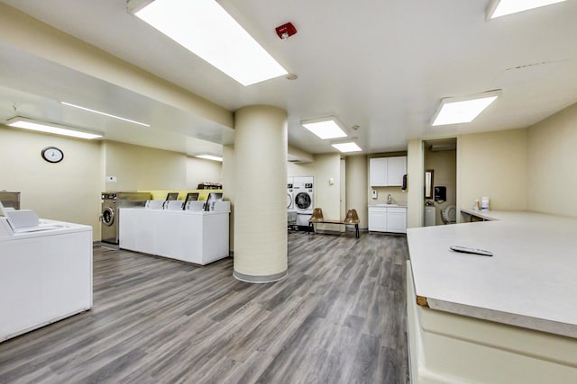 200 E Delaware Pl Unit 18F, Chicago, IL 60611 - shared laundry featuring washing machine and clothes dryer and wood finished floors