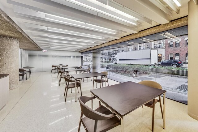 200 E Delaware Pl Unit 18F, Chicago, IL 60611 - dining room featuring speckle patterned floor