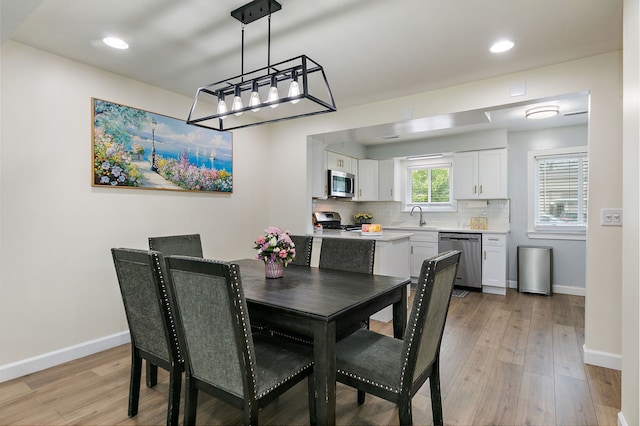 1083 Groton Ct, Schaumburg, IL 60193 - dining area featuring baseboards, light wood-style flooring, and recessed lighting
